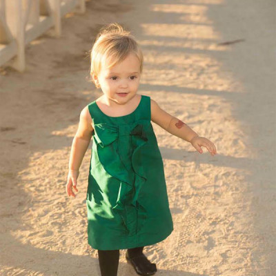 My older son picked out this dress (naturally) because of the color and I couldn't resist. This green and that ruffle were just too adorable. Oh, and that arm tattoo... well, nothing says classy like a tattoo on a baby. So much for temporary... that darn octopus won't come off!